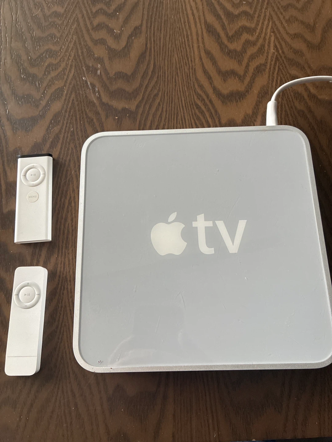 A MacBook, A PS3, An Apple TV and iPod and Remote and Cables