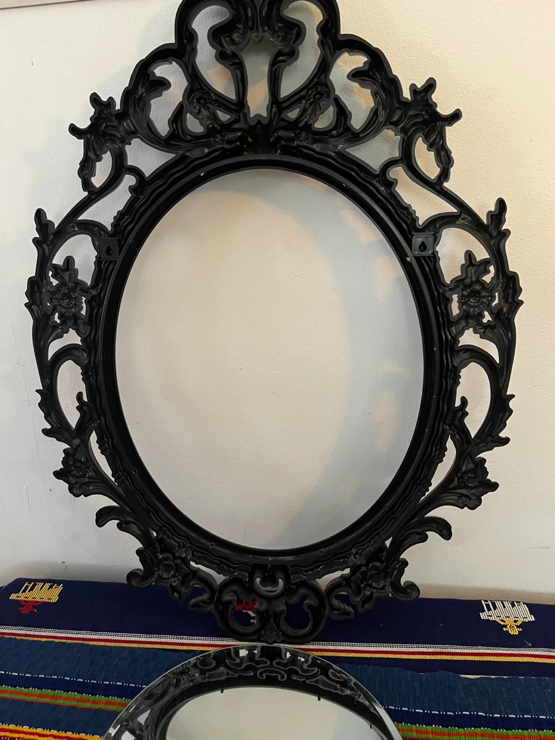 Ornate Black Oval plastic frame