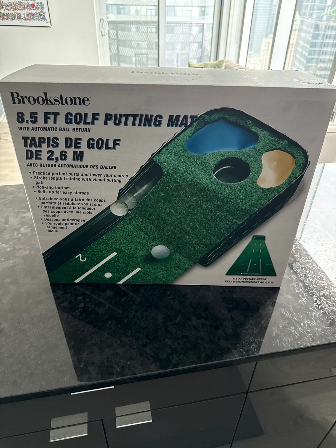 Brookstone 8.5 FT Golf Putting Mat with Automatic Ball Return