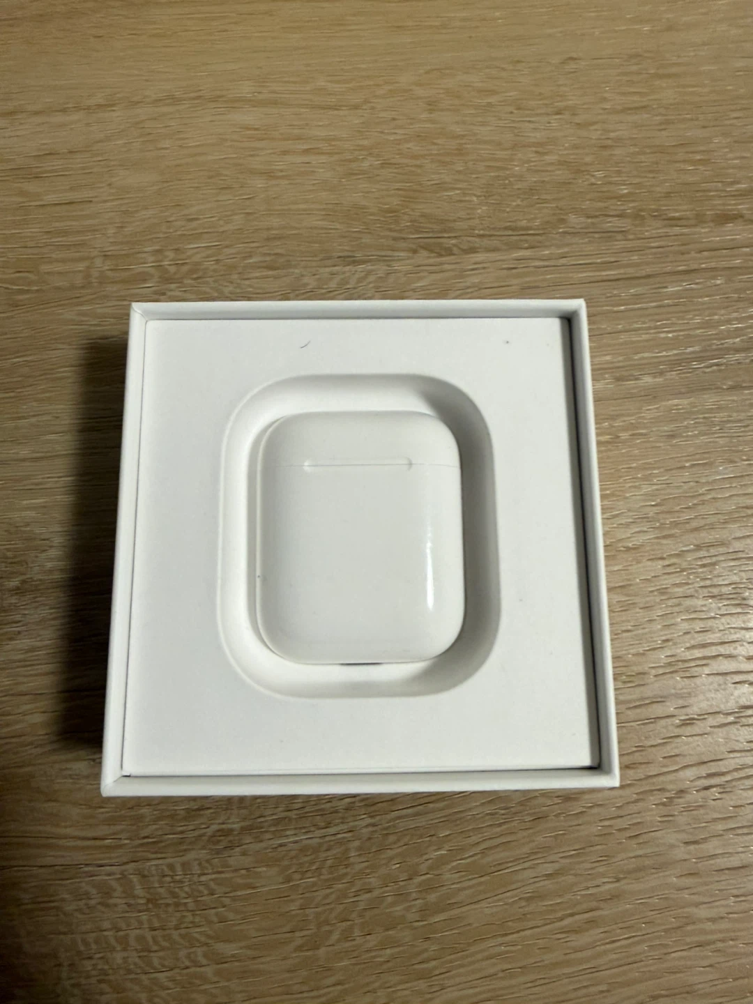 Apple AirPods with Charging Case (open box)