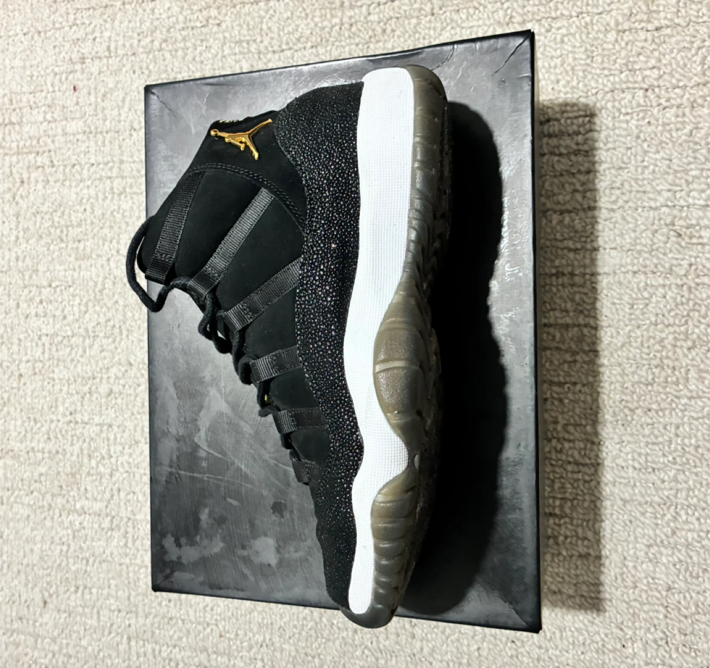 Air Jordan 11 Retro Black & Gold Sneakers