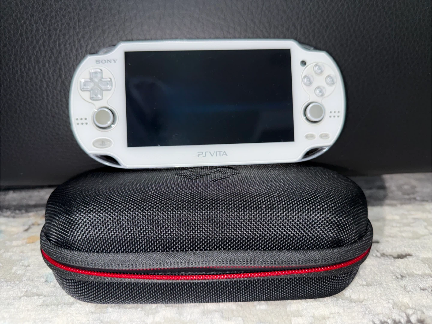 Sony PlayStation Vita 1000 and two games - photo 2