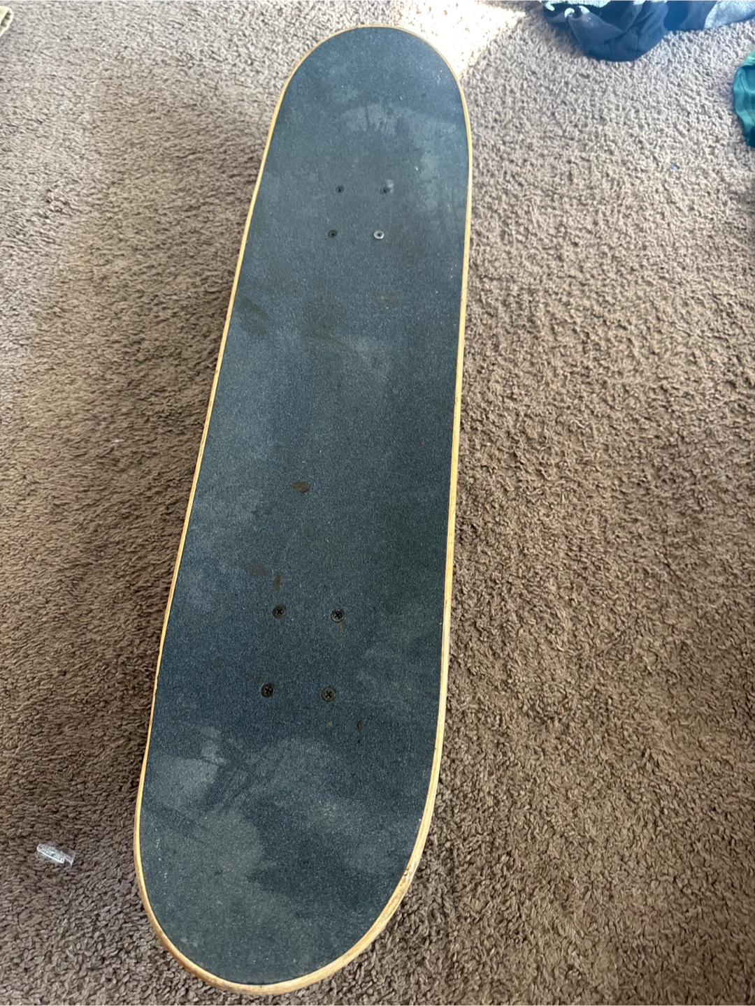 purple and green creature Skateboard