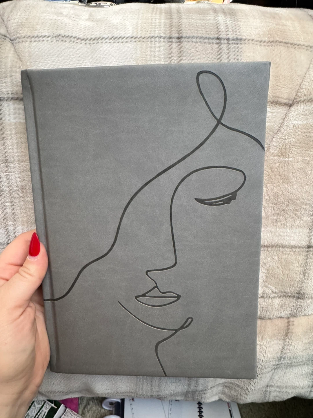 Grey Notebook with Abstract Face Design