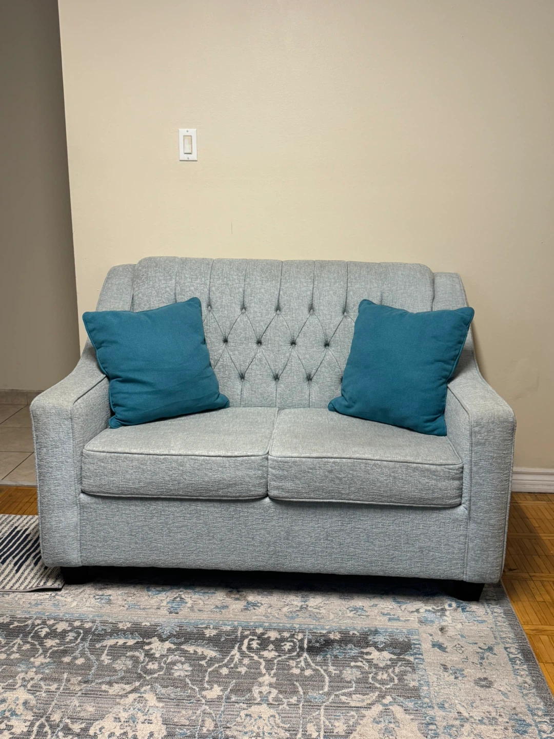 Teal Tufted Sofa