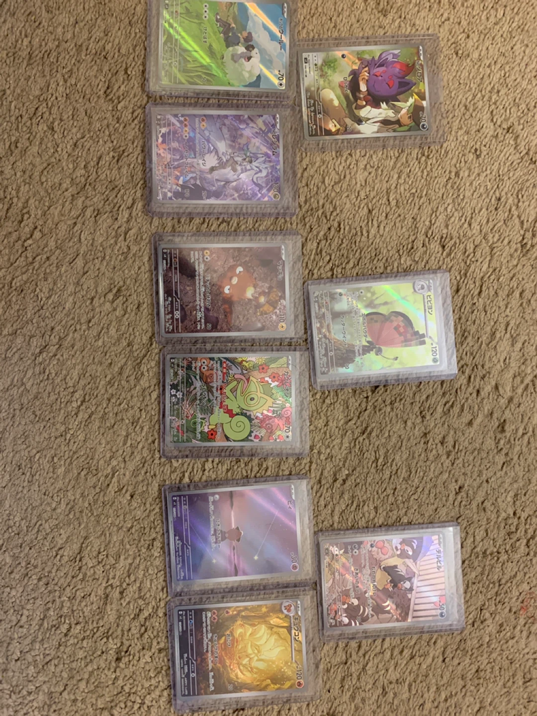 Collection of 9 Pokemon Trading Cards