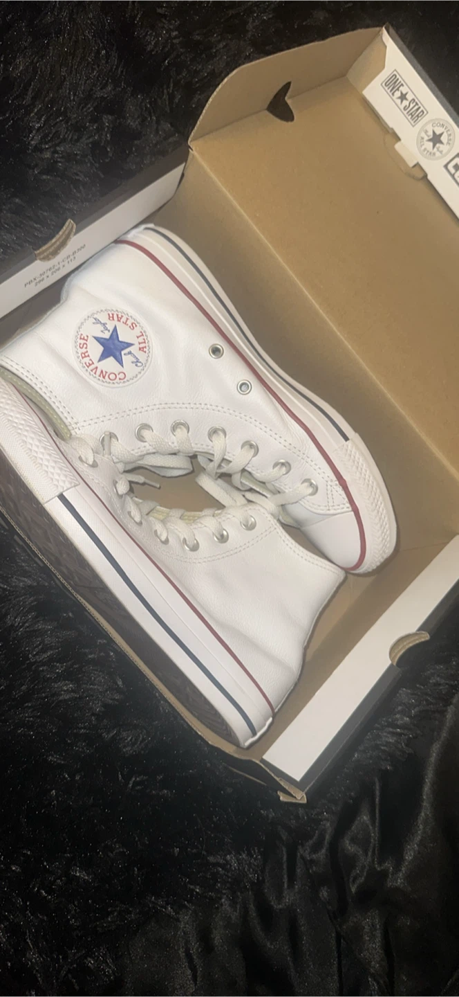 White Converse Chuck Taylor All Star High Top Sneakers