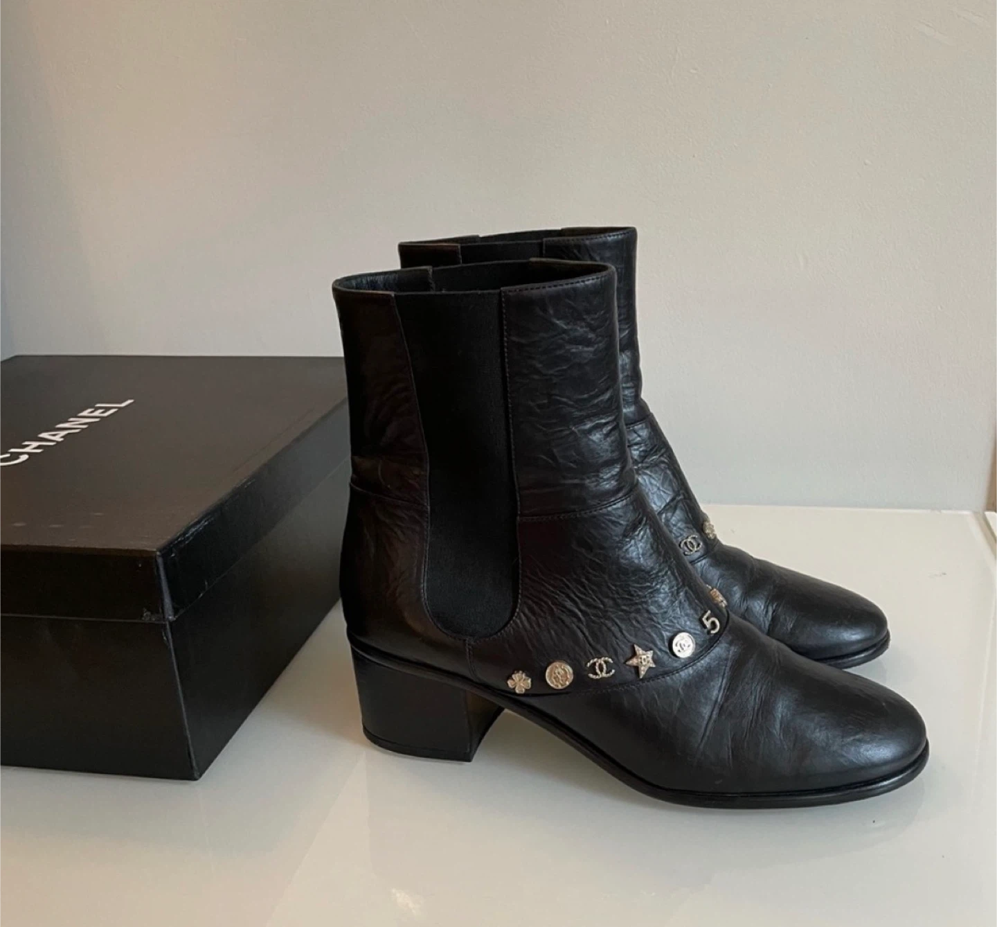 Chanel Black Leather Ankle Boots with Charms - photo 2