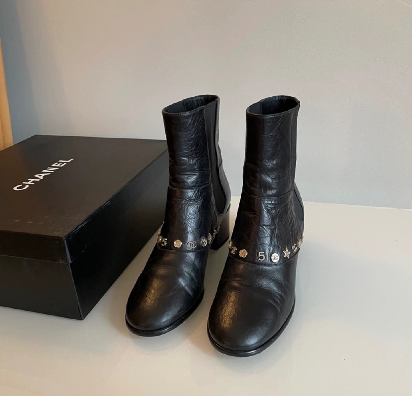 Chanel Black Leather Ankle Boots with Charms - photo 3