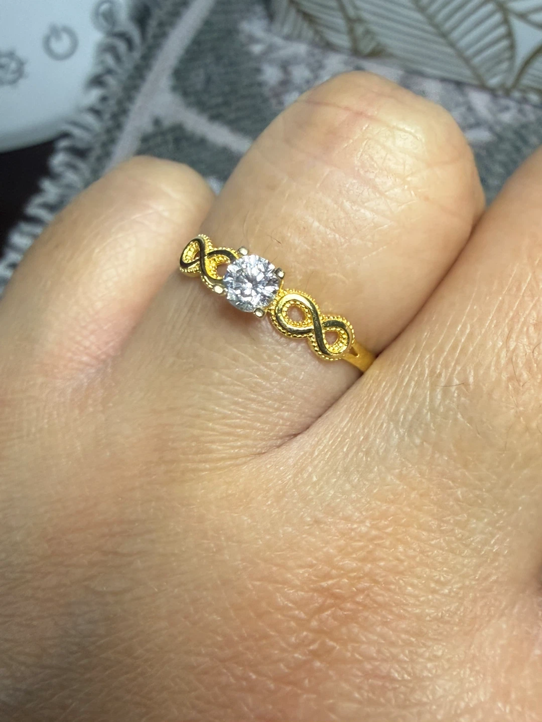 18K Gold Solitaire Ring with Infinity Detail