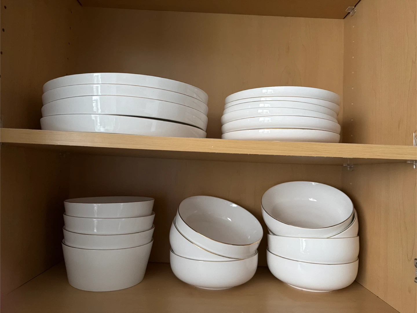 White Ceramic Bowls and Plates with Gold Rim