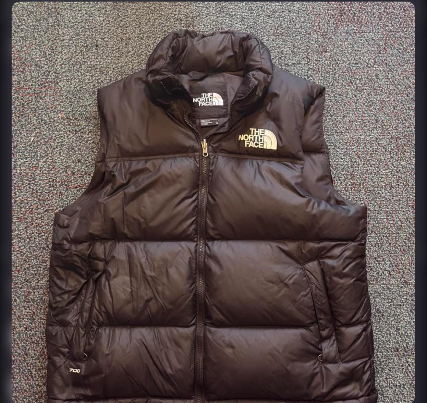 The North Face black puffer vest