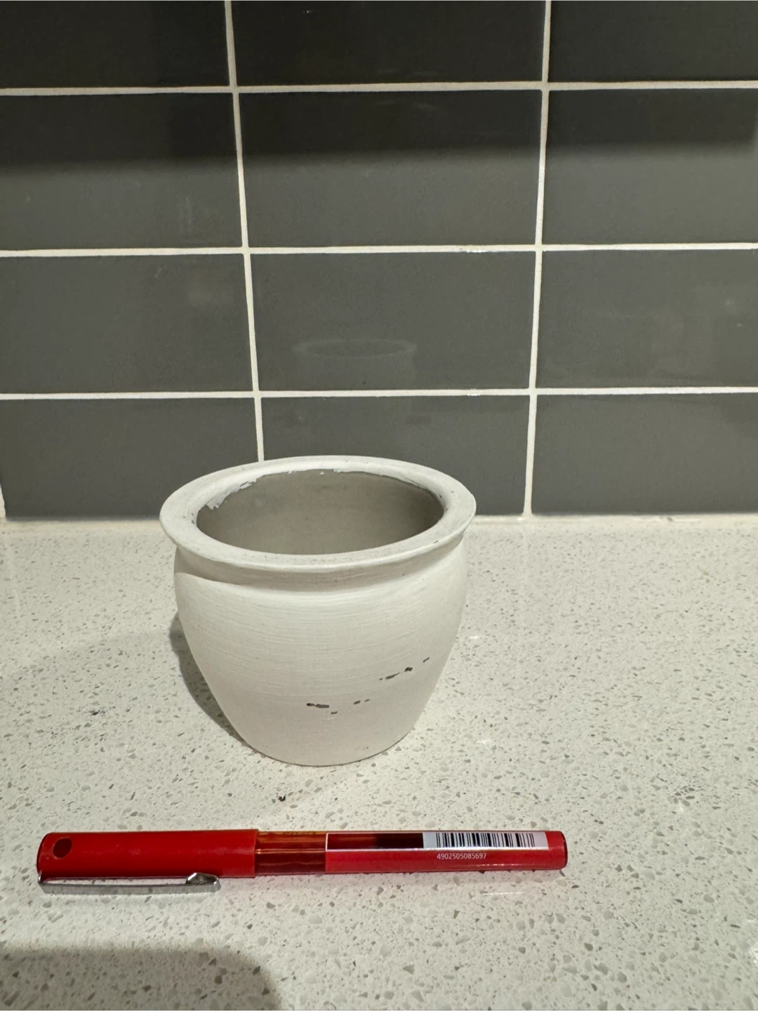 Small white ceramic planter pot