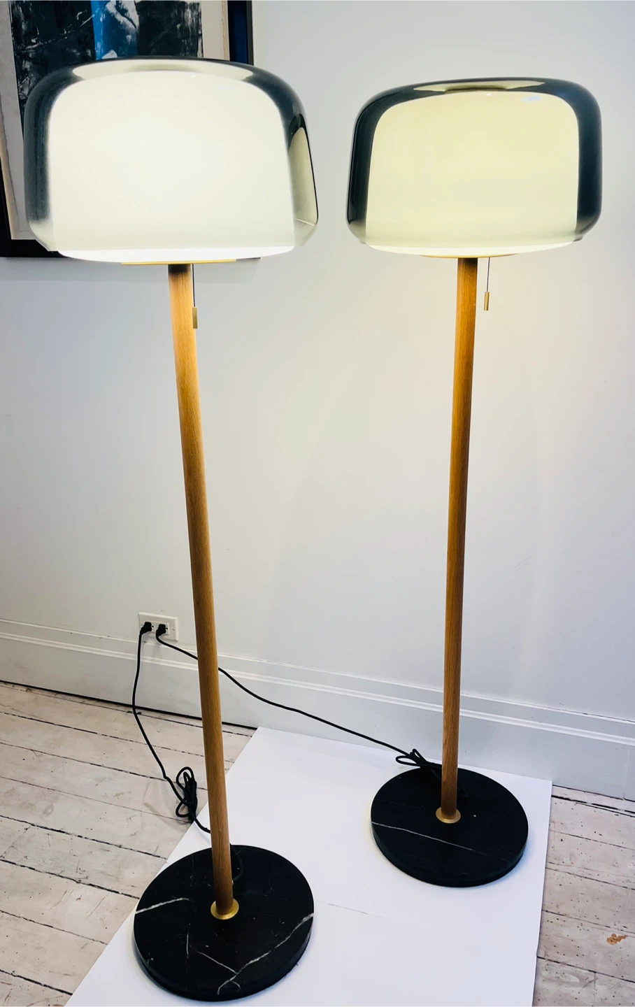 Gorgeous pair of modern floors lamps.