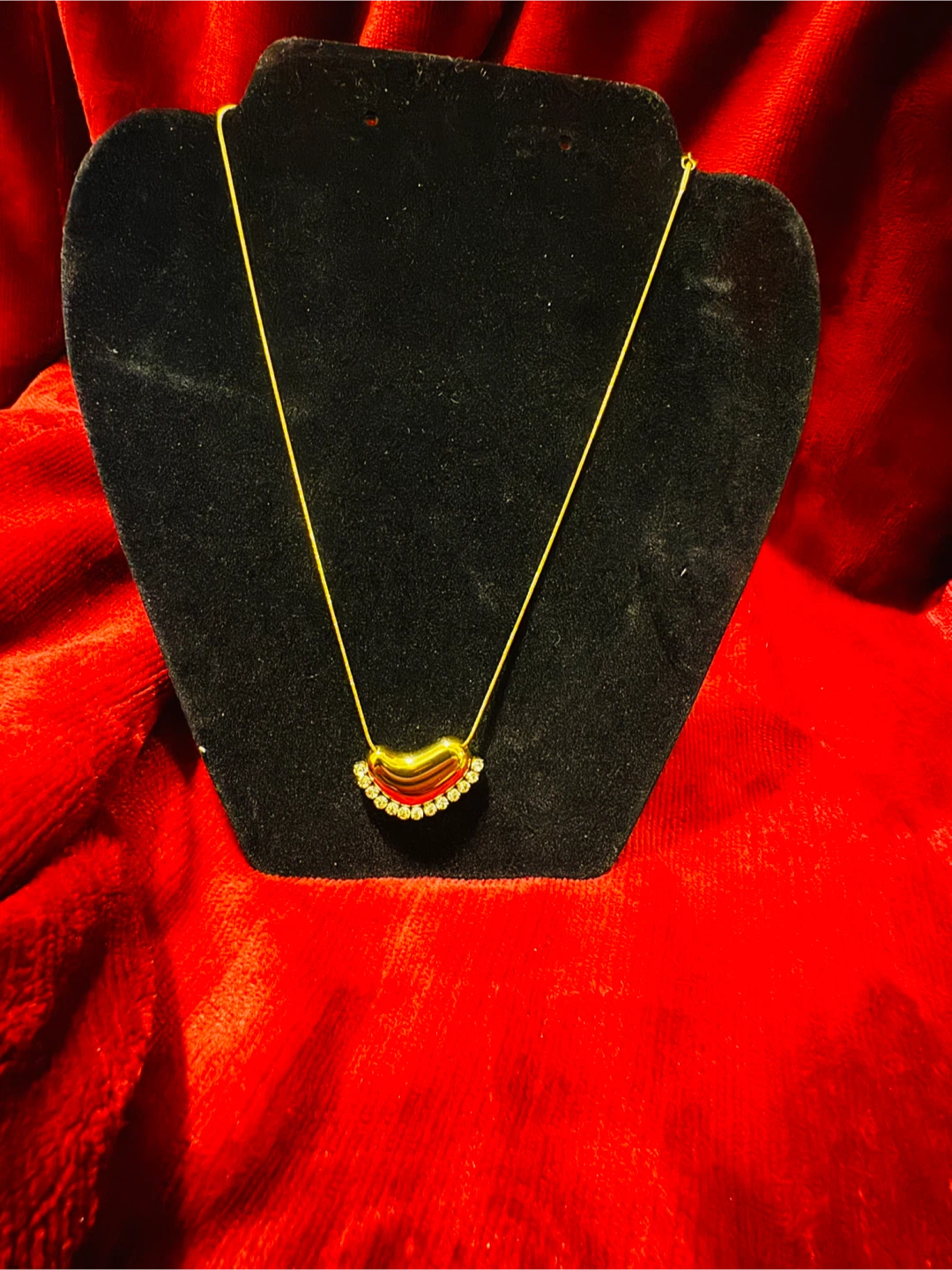 Gold Tone Necklace with Red and Crystal Pendant