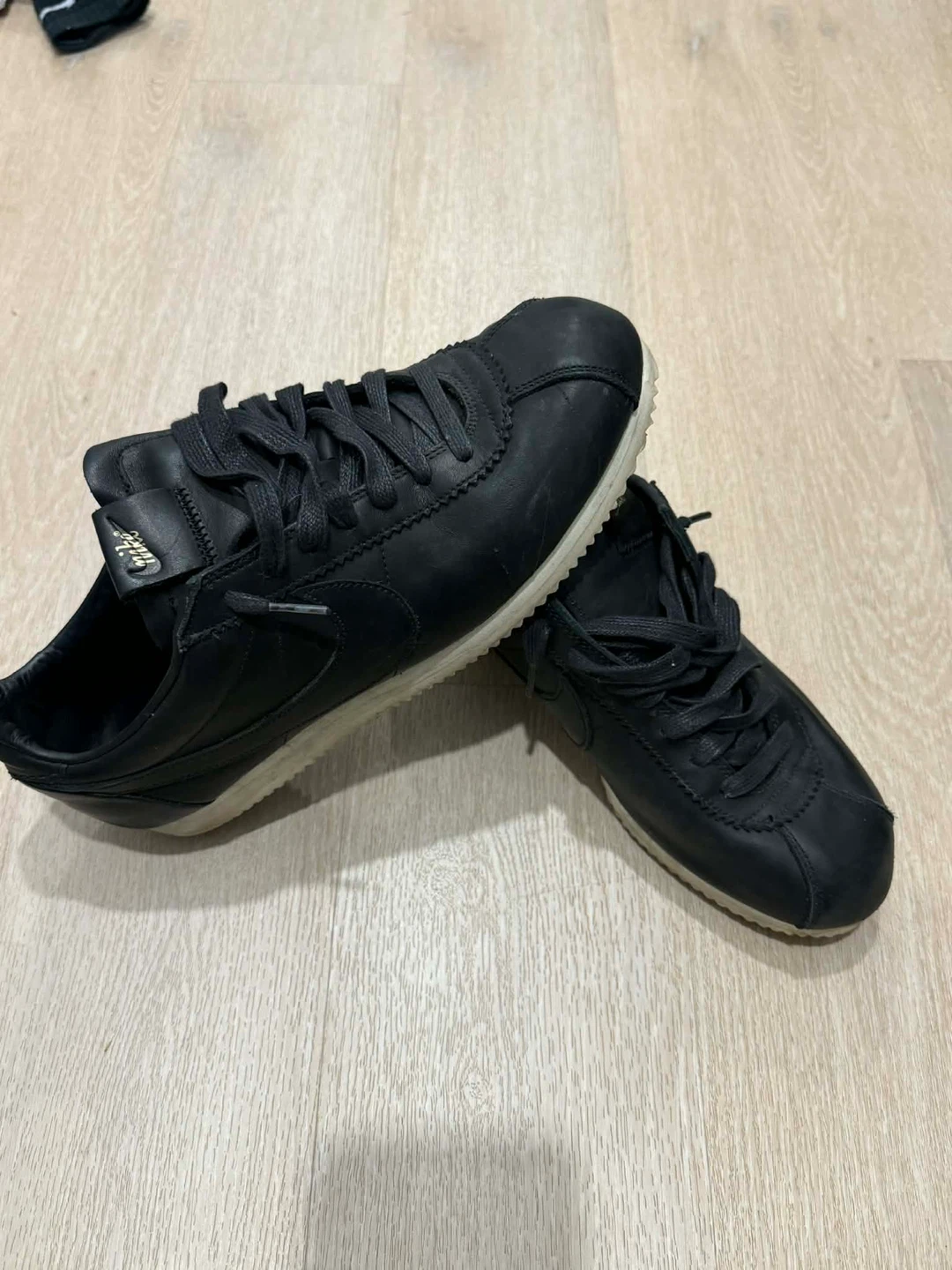 Black Nike Cortez Sneakers