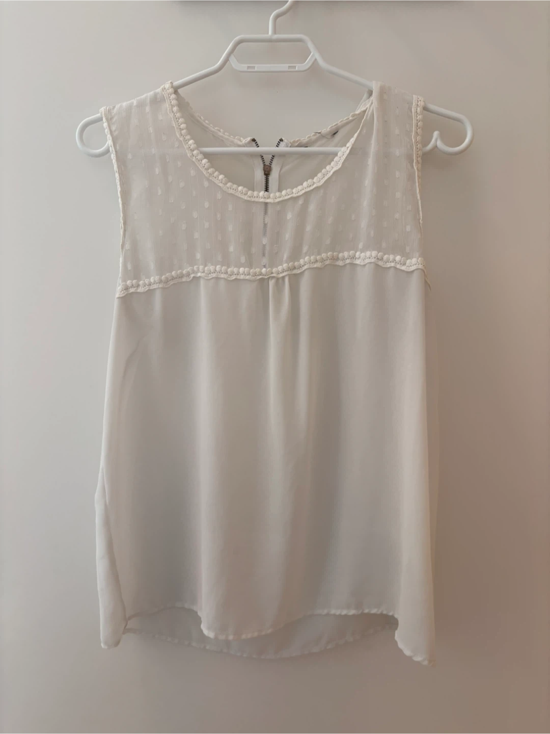White Sleeveless Top with Lace Trim