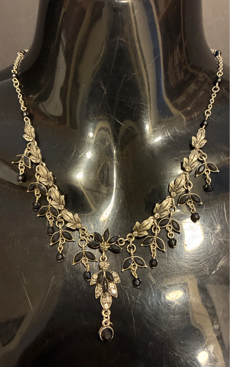 Silver-tone Necklace with Black Beads and Leaf Design