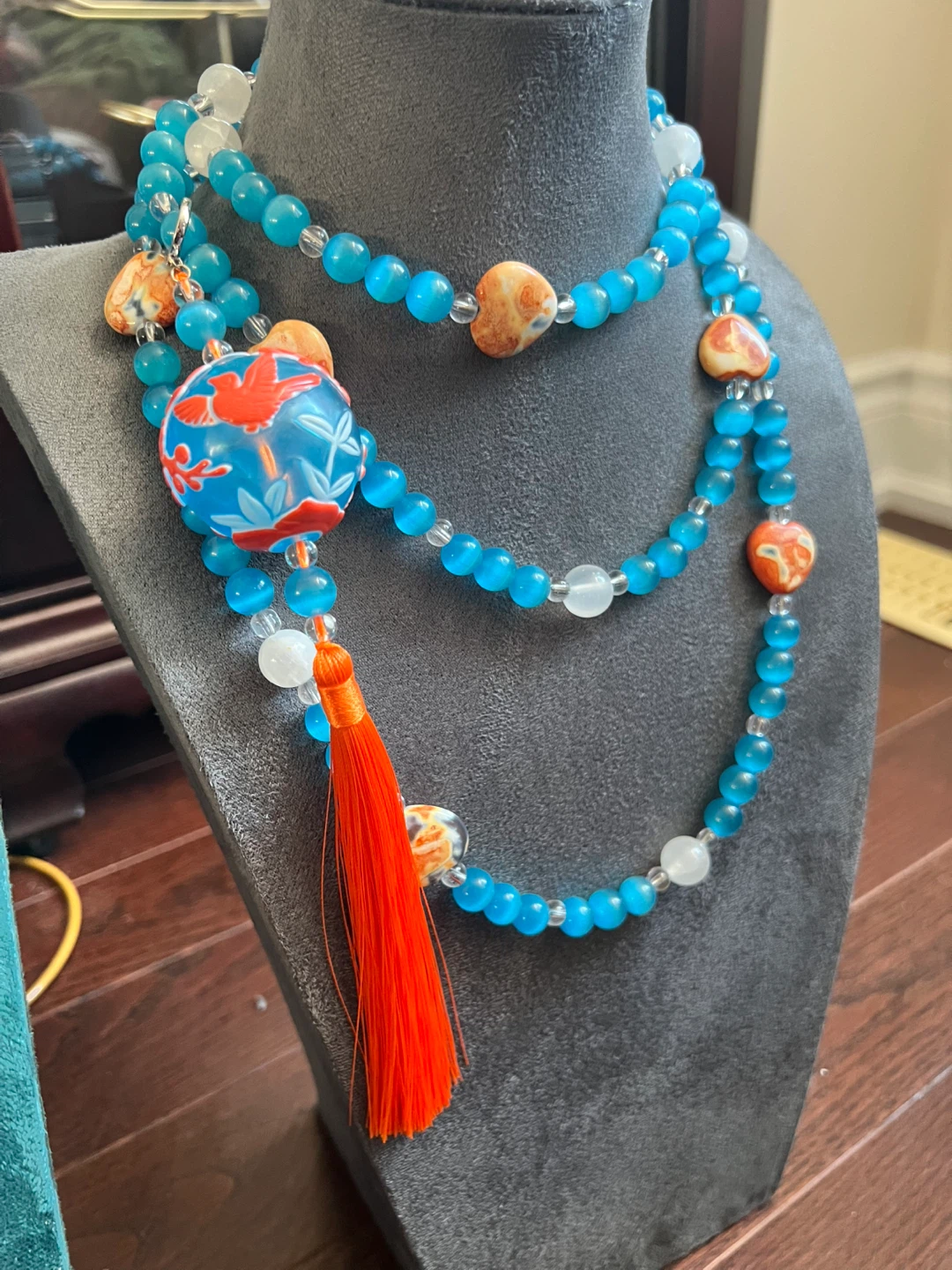Beaded Necklace with Tassel and Charm