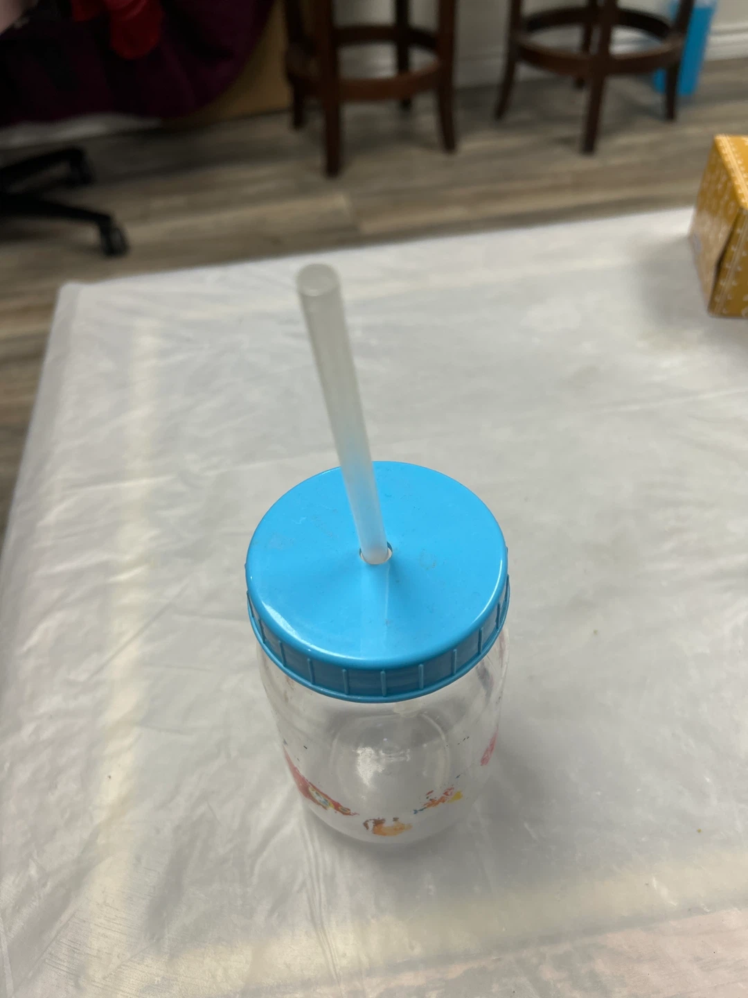 Plastic Tumbler with Blue Lid and Straw