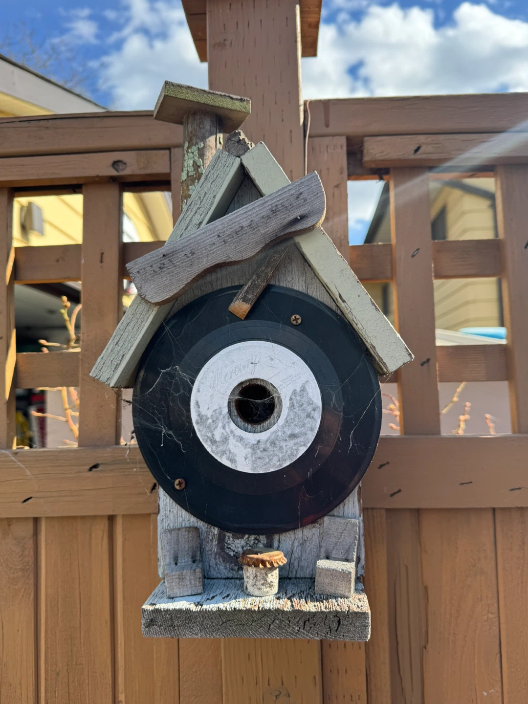Rustic Wooden Birdhouse with Vinyl Record Decoration