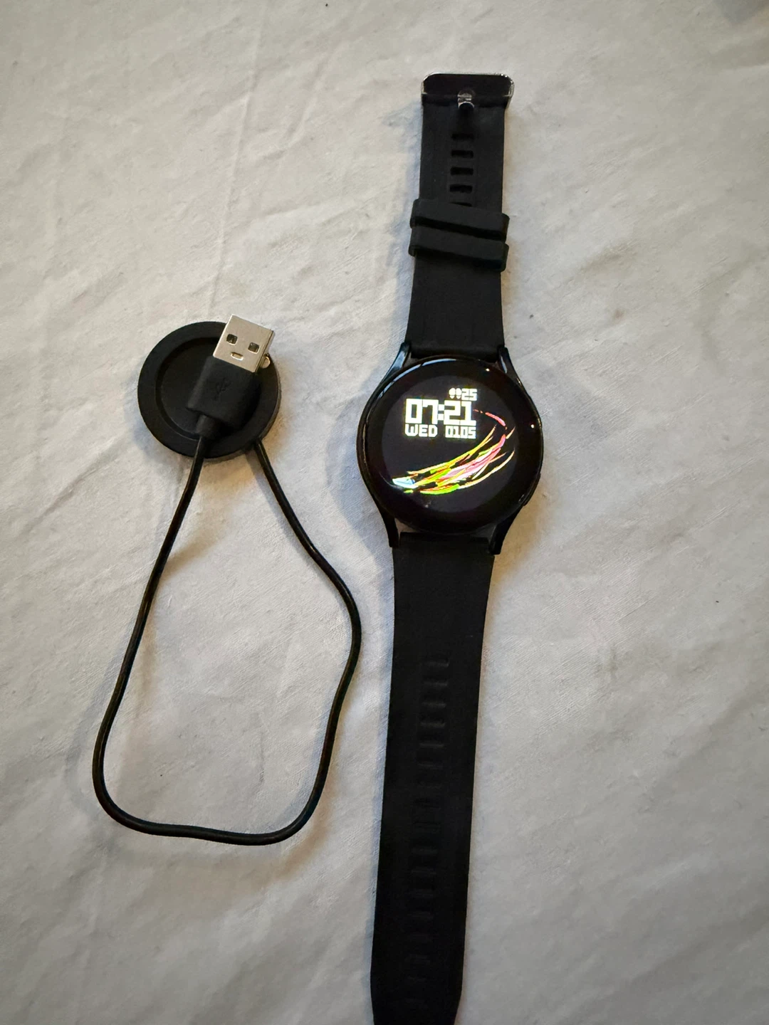 Black Smartwatch with Charger