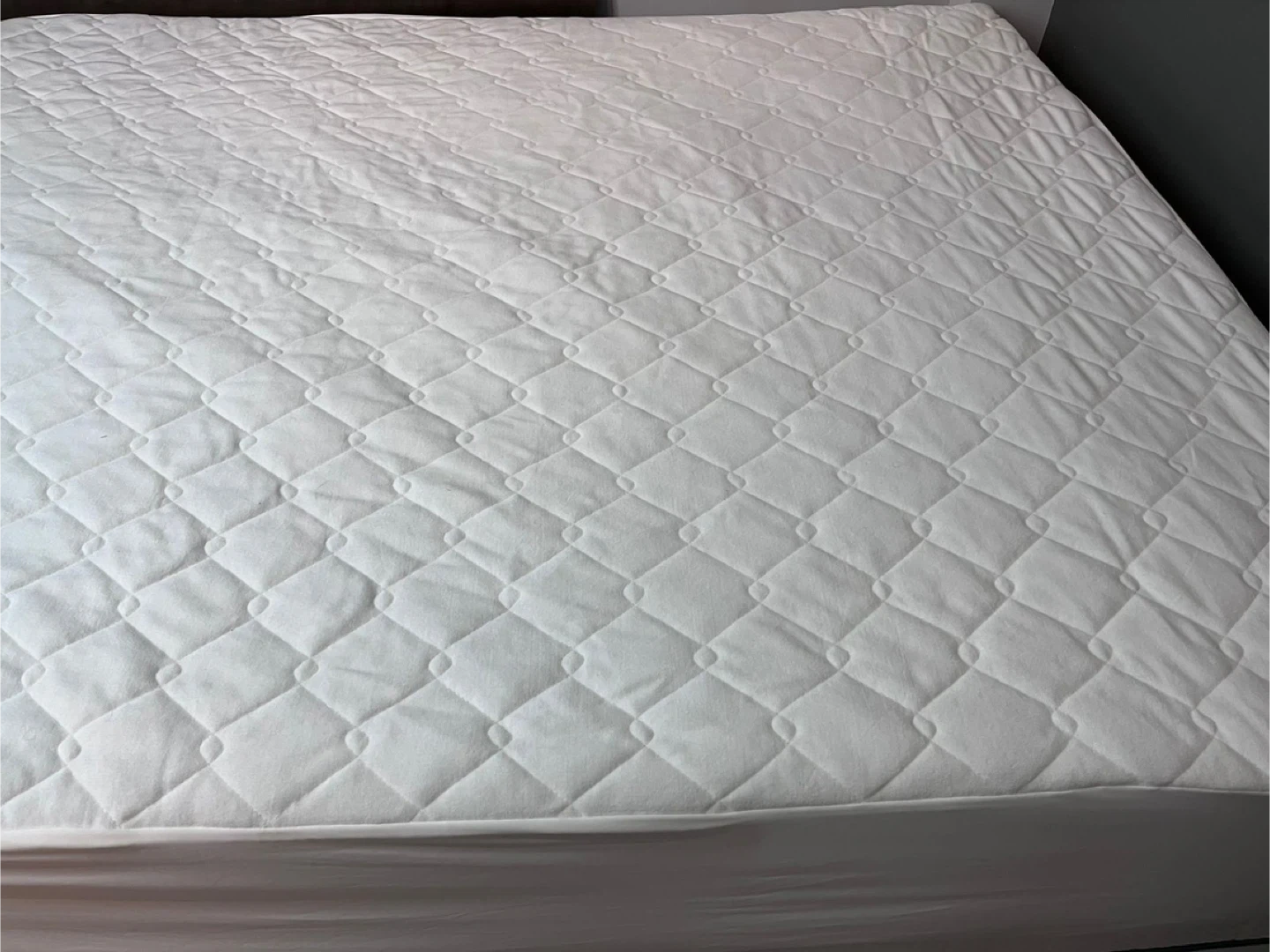 Queen size mattress with protector