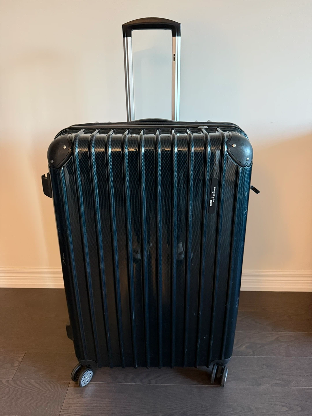 Black Hardside Spinner Suitcase