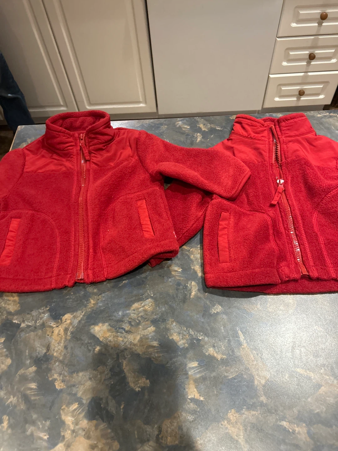 Two Red Fleece Jackets