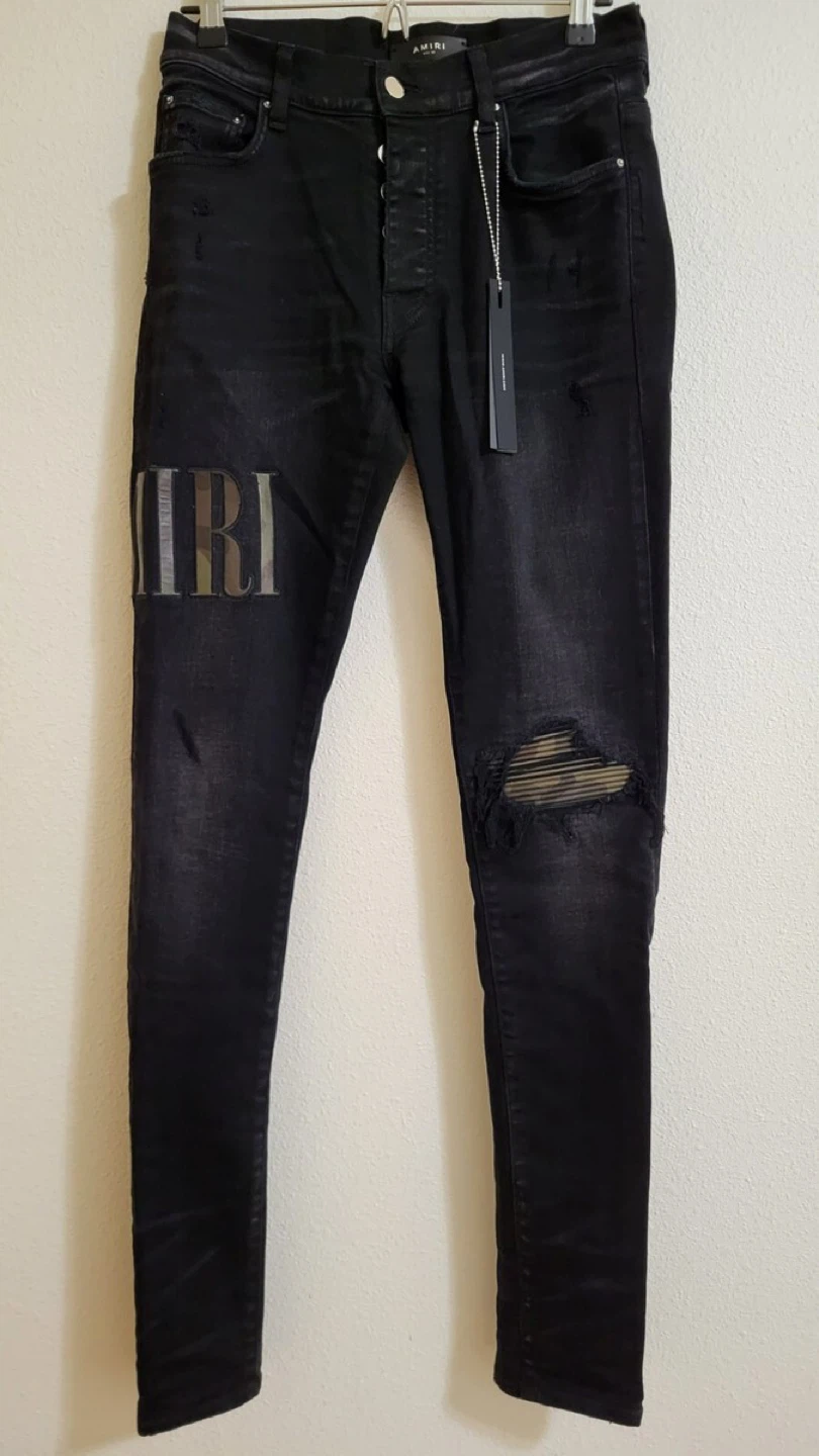 AMIRI Black Distressed Jeans with Patch Detail