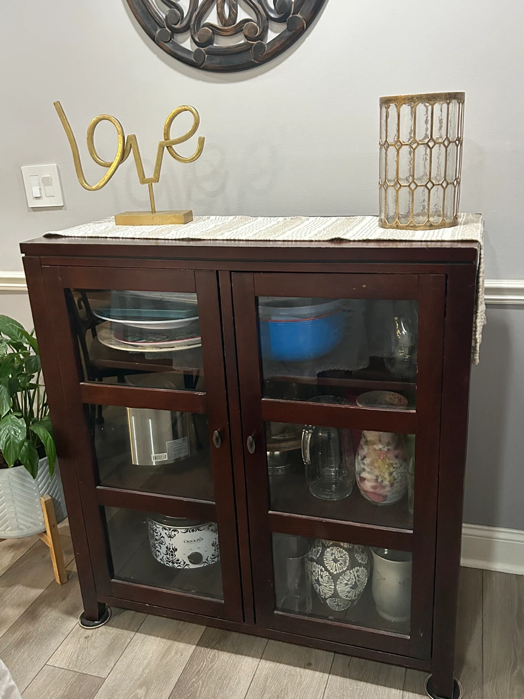 Dark Wood Cabinet with Glass Doors