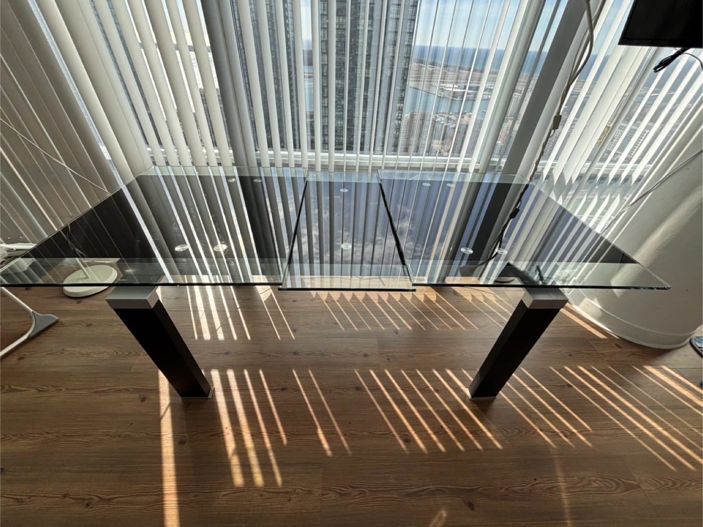 Moving sale- Extendable Glass Top Dining Table with Black Legs - photo 4