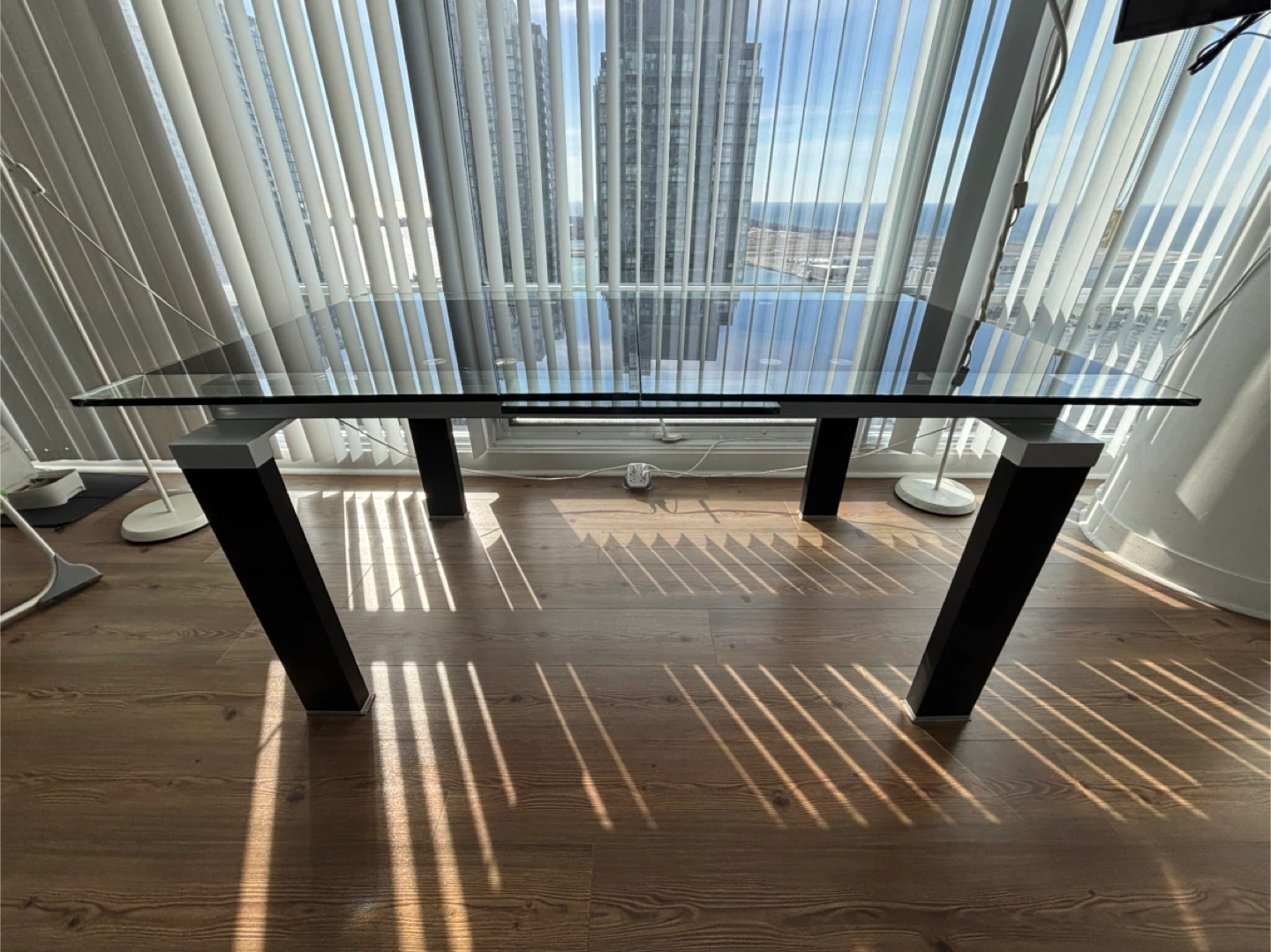Moving sale- Extendable Glass Top Dining Table with Black Legs - photo 5