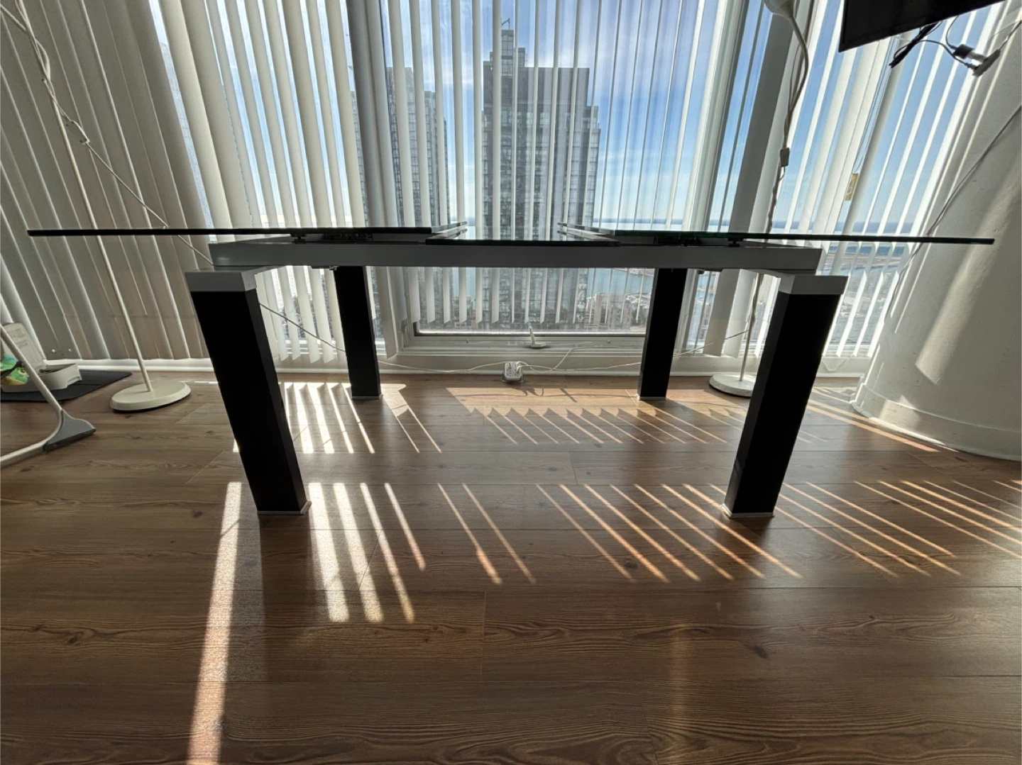 Moving sale- Extendable Glass Top Dining Table with Black Legs - photo 3