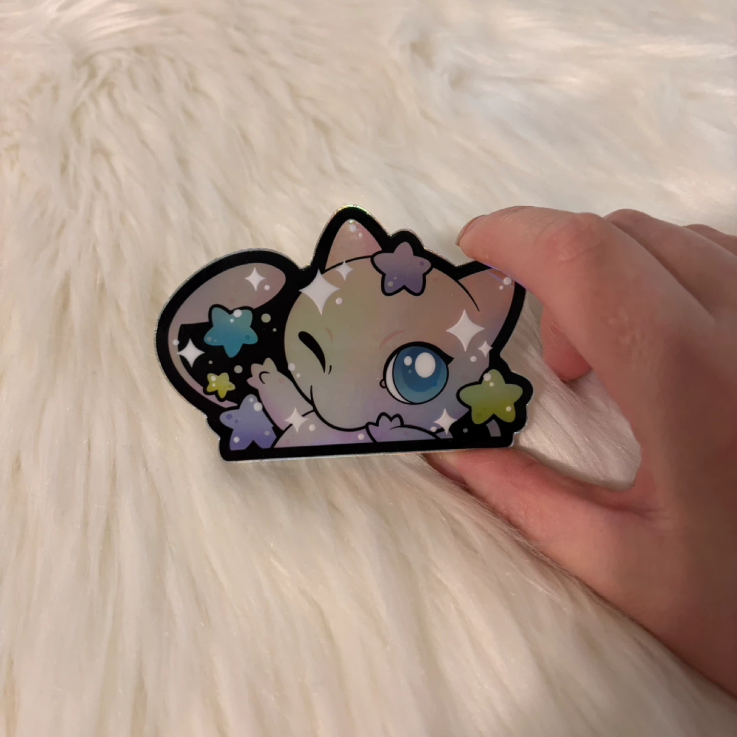 Holographic Mew Sticker by Michelle Coffee
