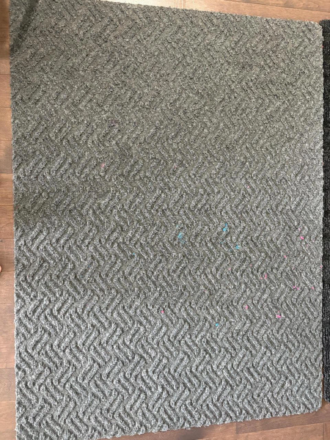 Grey Area Rug with Herringbone Pattern