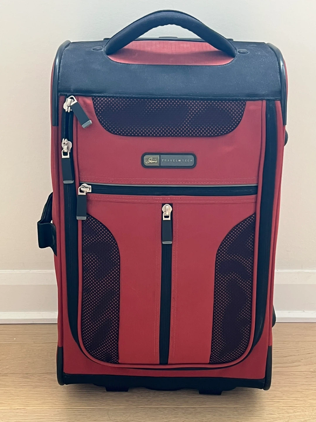 Travel Tech Orange Carry-On Rolling Luggage