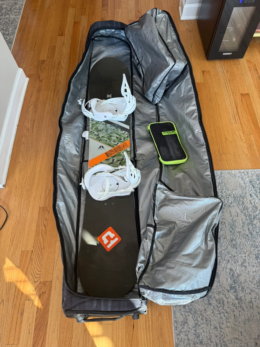 Forum 158 snowboard, Dakine travel case, tuning kit