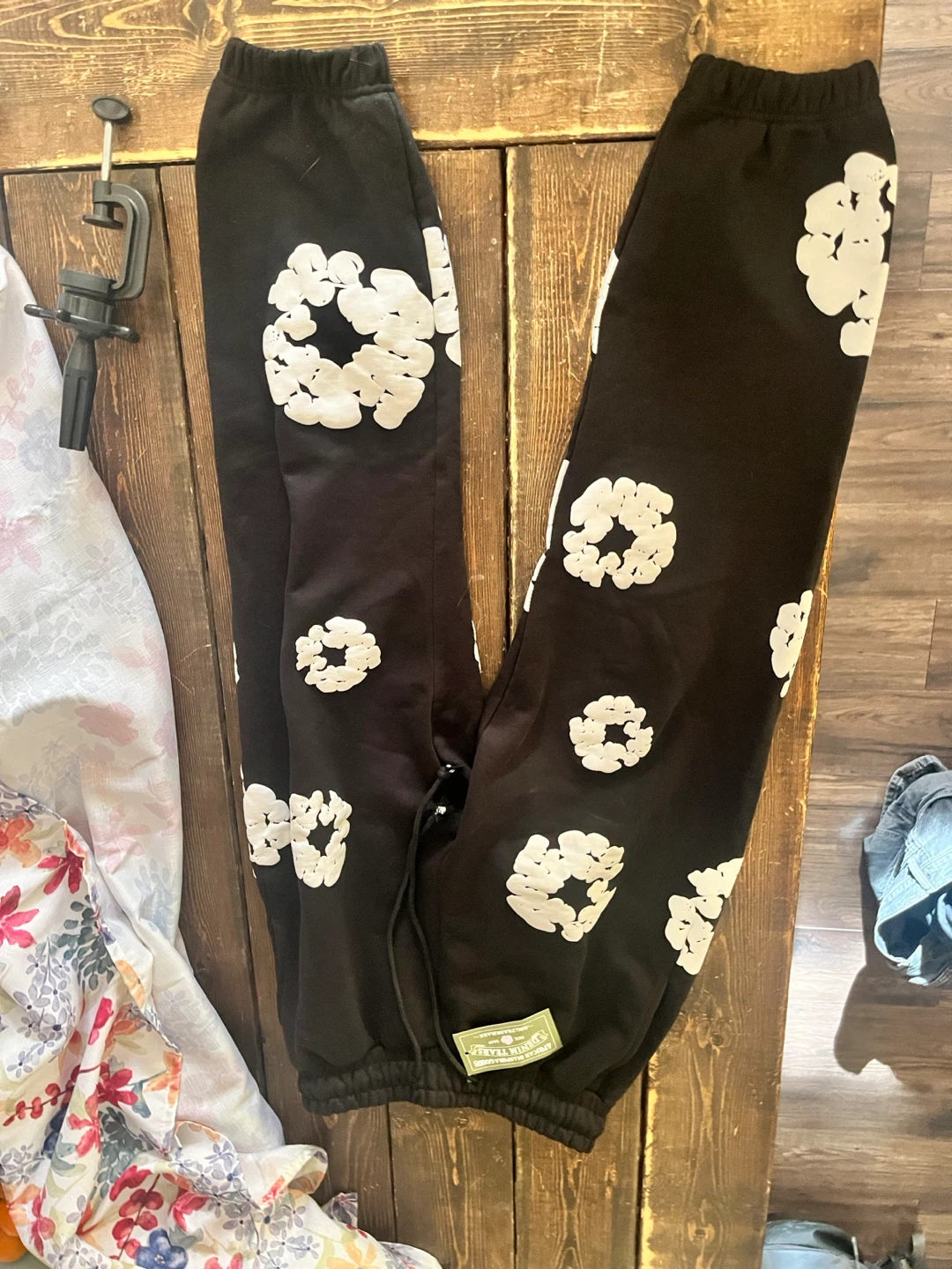 Denim Tears Black Sweatpants with White Floral Print - photo 2