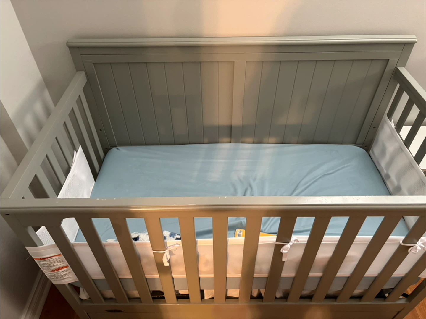 Grey Convertible Crib with Mattress Pad