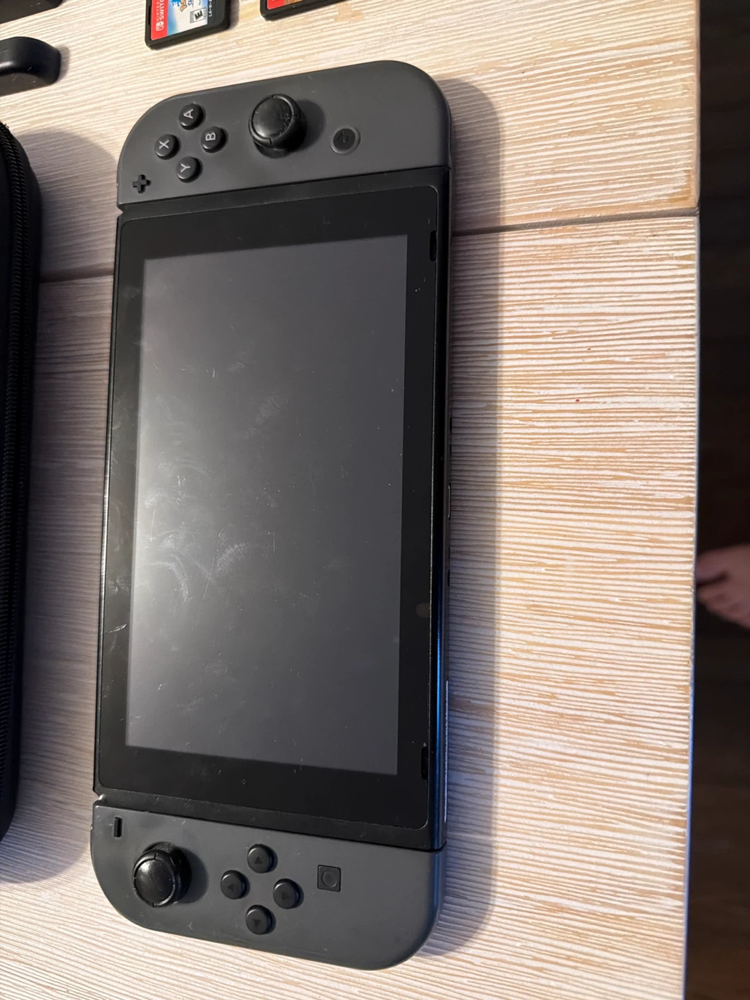 Nintendo Switch + Carrying Case with Accessories and games
