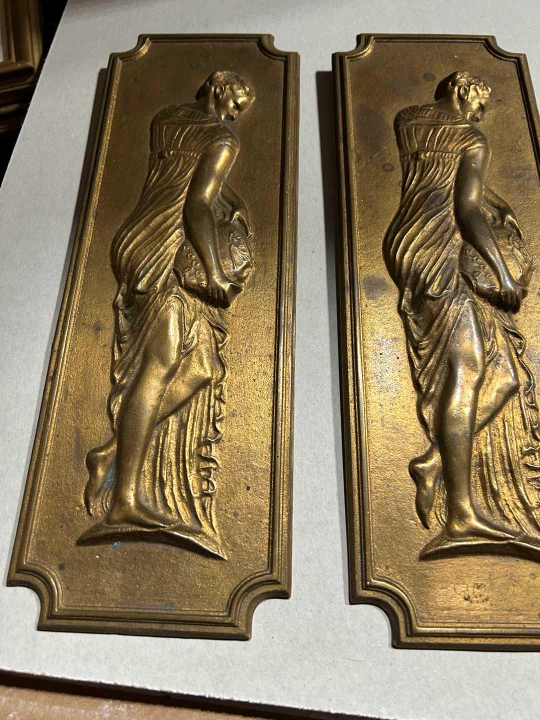 Pair of Antique Embossed Brass Plaques