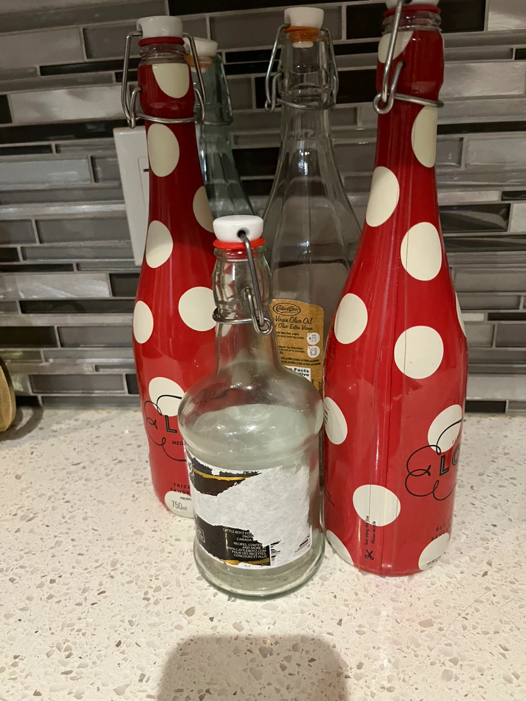 Set of 4 Decorative Glass Bottles with Swing Tops