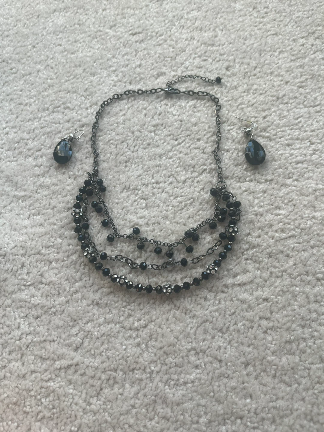 Black layered beaded necklace and earrings set