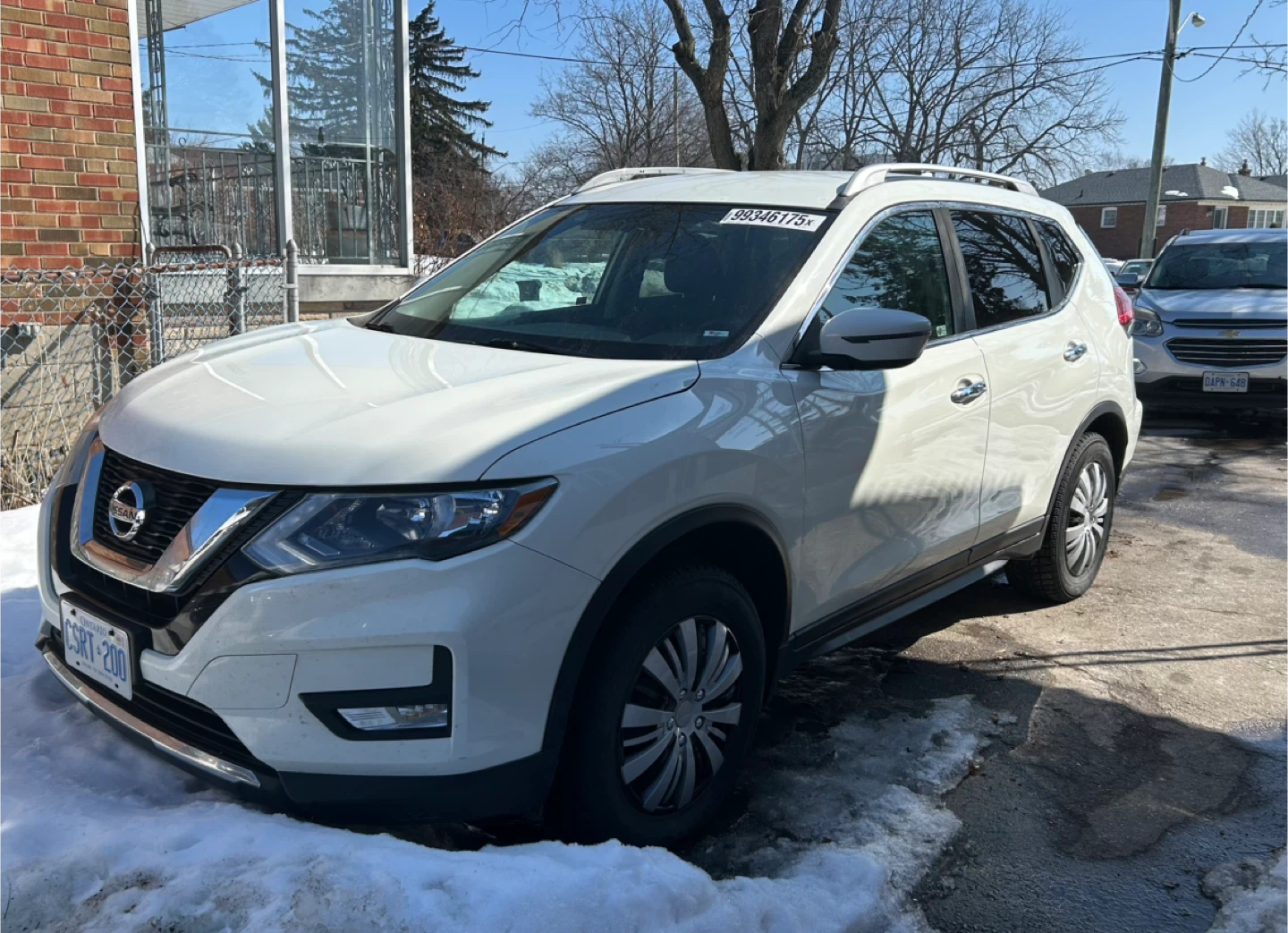 White Nissan Rogue SV AWD SUV
