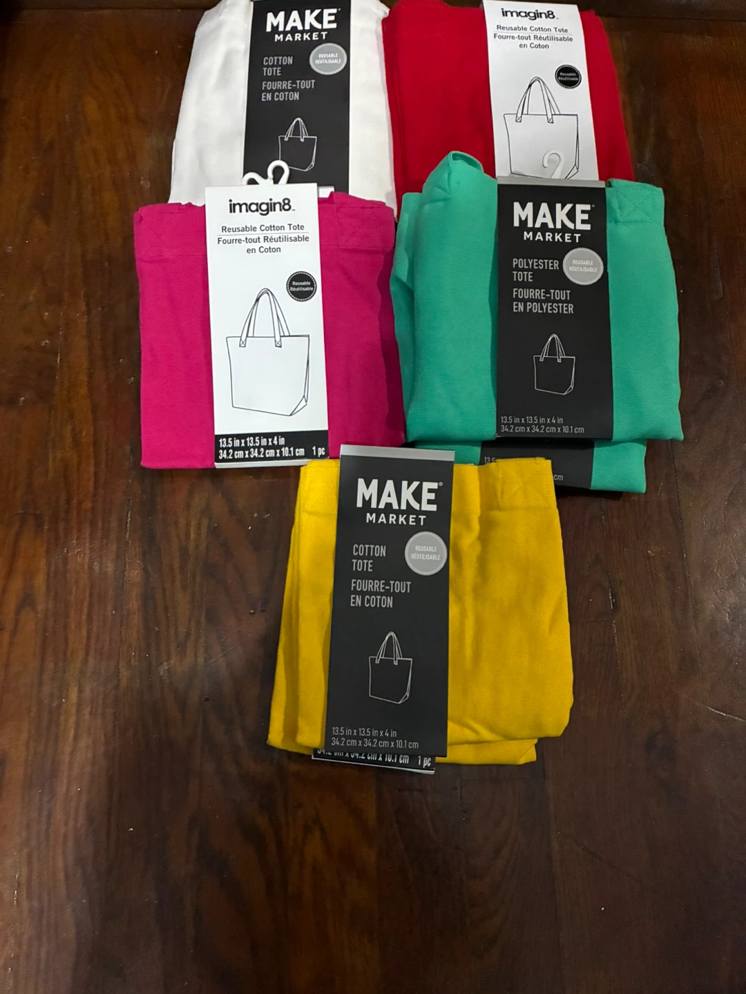 Cotton colored tote bags and one poly bag