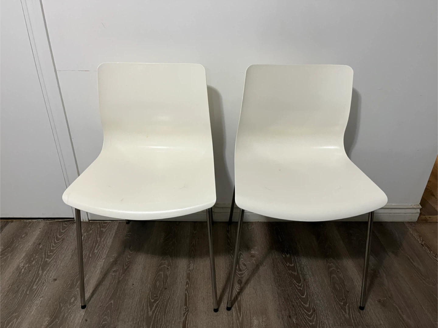 Pair of White Chairs with Metal Legs