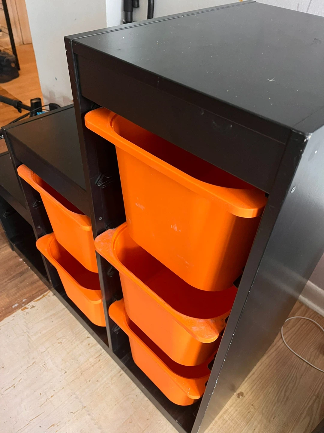 IKEA Black Storage Unit with Orange Bins