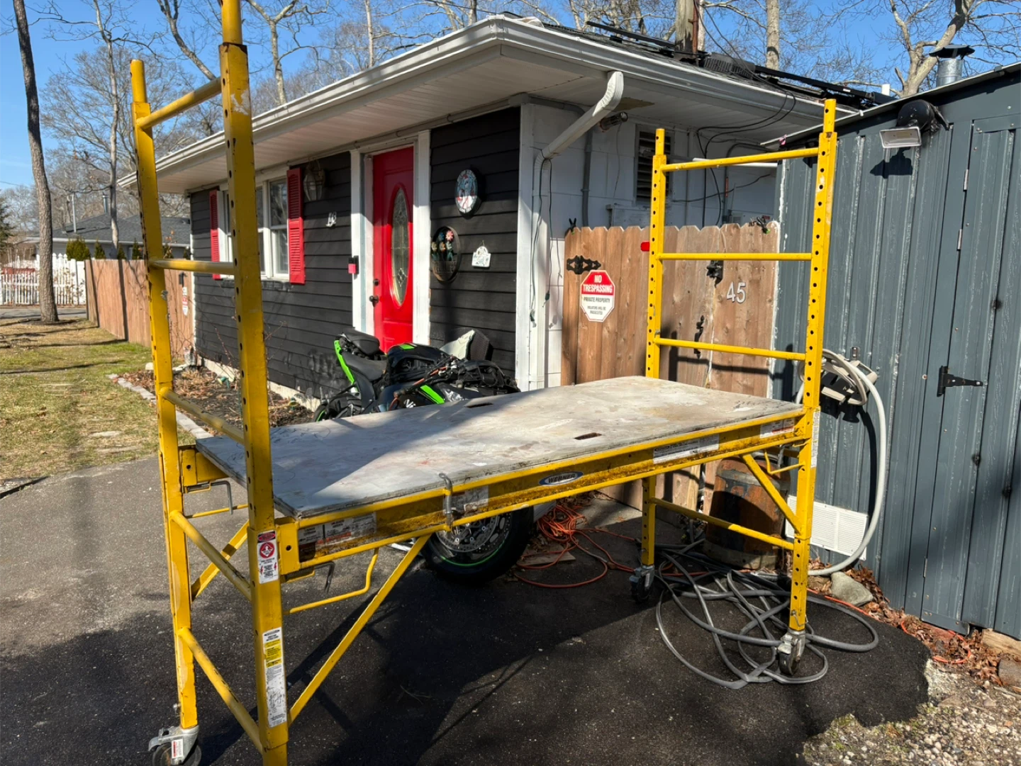 Yellow Scaffolding Platform with Wheels