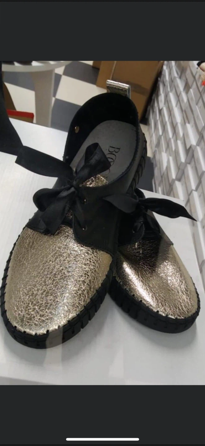 Black and Gold Shoes with Ribbon Bows